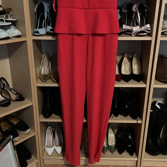 Red jumpsuit with ruffle top. Never worn tag still attached - Picture 3 of 4